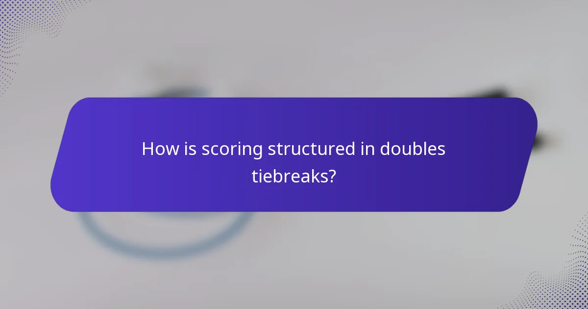 How is scoring structured in doubles tiebreaks?