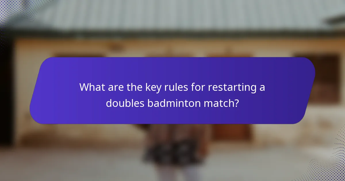 What are the key rules for restarting a doubles badminton match?