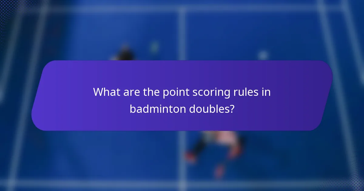 What are the point scoring rules in badminton doubles?