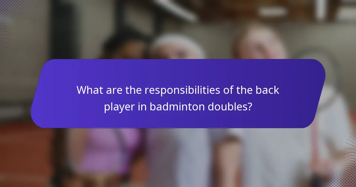 What are the responsibilities of the back player in badminton doubles?